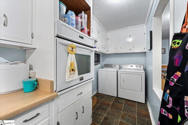 116 Kennedy St, Easley, SC 29642 - laundry room with washer and dryer, stone finish flooring, and a textured ceiling