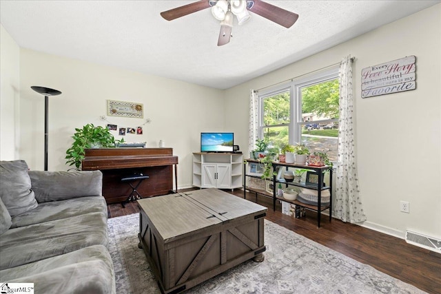116 Kennedy St, Easley, SC 29642 - living area featuring wood finished floors, a ceiling fan, and baseboards