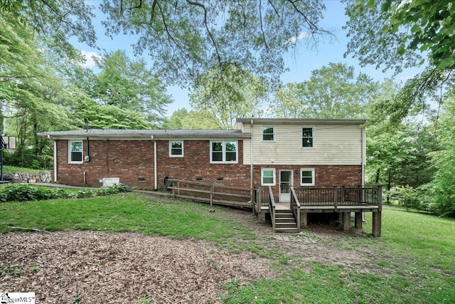 116 Kennedy St, Easley, SC 29642 - rear view of property featuring a deck, a yard, and brick siding