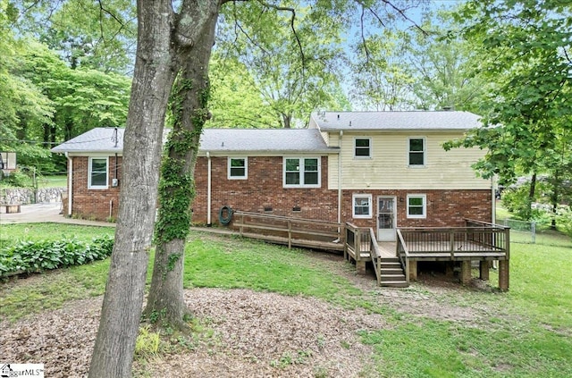 116 Kennedy St, Easley, SC 29642 - rear view of house with a deck, a lawn, and brick siding
