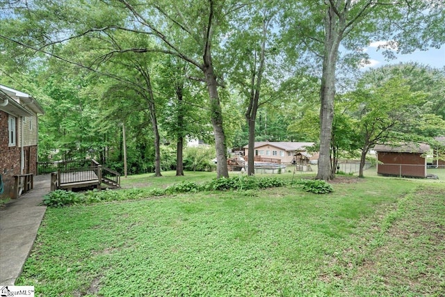 116 Kennedy St, Easley, SC 29642 - view of grassy yard featuring a wooden deck