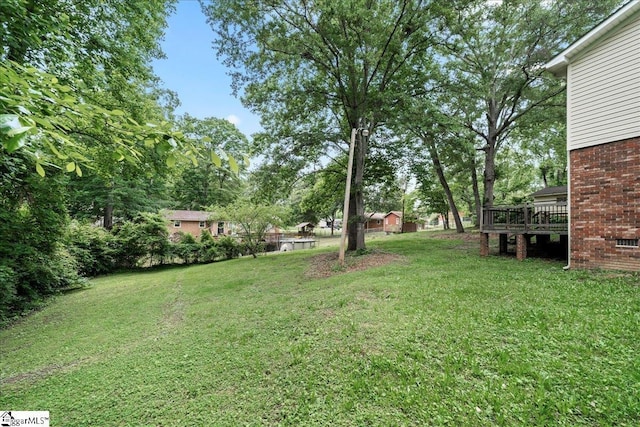 116 Kennedy St, Easley, SC 29642 - view of grassy yard with a wooden deck