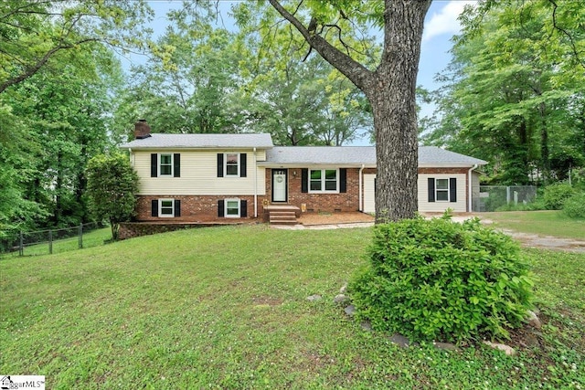 116 Kennedy St, Easley, SC 29642 - split level home featuring a chimney and brick siding