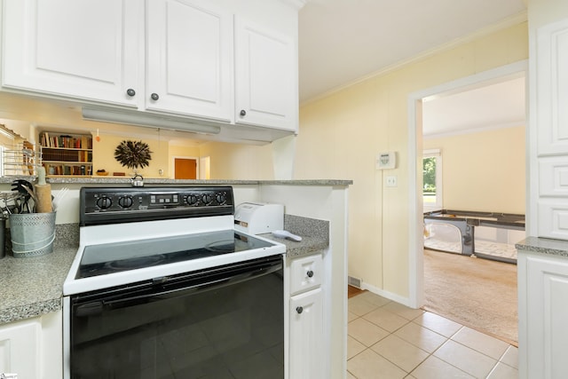 2807 Bellview Rd, Anderson, SC 29621 - kitchen featuring electric range, ornamental molding, light colored carpet, white cabinets, and light countertops