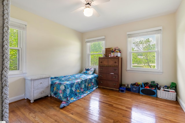 2807 Bellview Rd, Anderson, SC 29621 - bedroom with wood finished floors, multiple windows, and ceiling fan