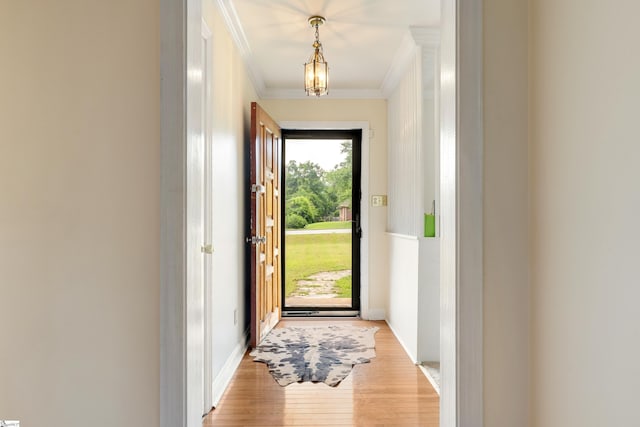 2807 Bellview Rd, Anderson, SC 29621 - doorway featuring crown molding, light wood-style flooring, and baseboards