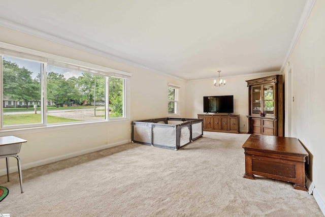 2807 Bellview Rd, Anderson, SC 29621 - unfurnished living room featuring a chandelier, crown molding, carpet flooring, and baseboards
