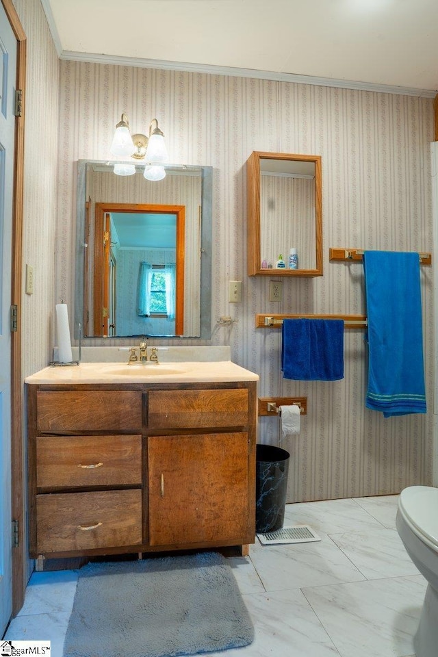 345 P Cromer Rd, Abbeville, SC 29620 - bathroom with vanity, toilet, marble look tiles, and wallpapered walls