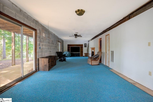 345 P Cromer Rd, Abbeville, SC 29620 - unfurnished living room with carpet flooring and a ceiling fan