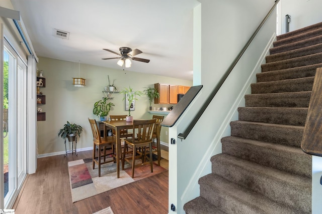 9 Hollow Tree Way, Greenville, SC 29605 - dining room with stairway, dark wood-style flooring, ceiling fan, and baseboards