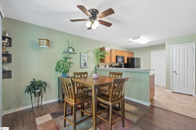 9 Hollow Tree Way, Greenville, SC 29605 - dining space featuring dark wood-type flooring, a ceiling fan, and baseboards