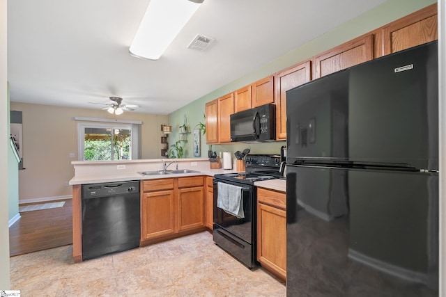 9 Hollow Tree Way, Greenville, SC 29605 - kitchen with black appliances, a sink, a peninsula, light countertops, and ceiling fan