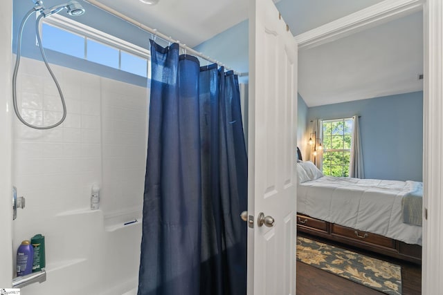 9 Hollow Tree Way, Greenville, SC 29605 - ensuite bathroom with shower / bathtub combination with curtain and wood finished floors