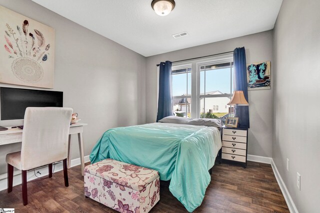 105 Devonfield Dr, Greer, SC 29651 - bedroom with dark wood-style flooring, baseboards, and a desk