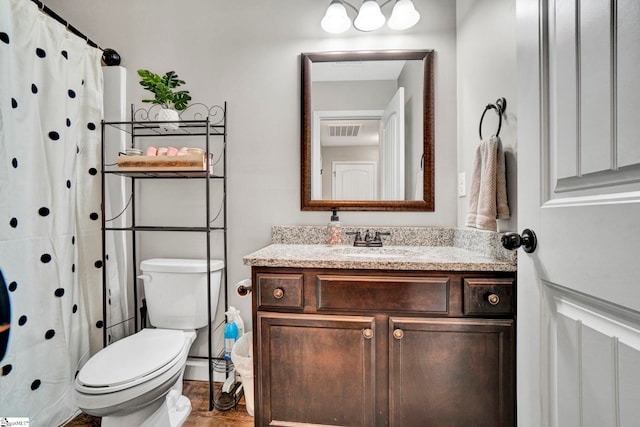 105 Devonfield Dr, Greer, SC 29651 - full bathroom with toilet, vanity, wood finished floors, and a shower with shower curtain