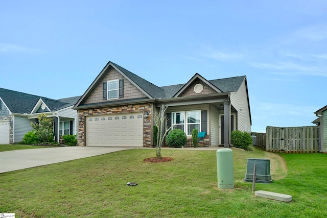 105 Devonfield Dr, Greer, SC 29651 - view of front of home featuring driveway, stone siding, and a gate