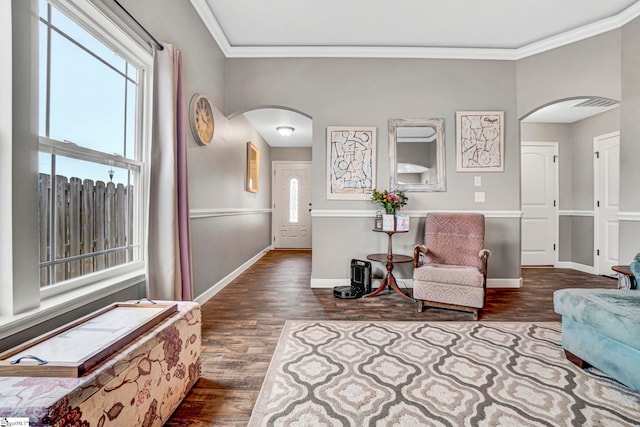 105 Devonfield Dr, Greer, SC 29651 - sitting room featuring arched walkways, dark wood finished floors, crown molding, and baseboards