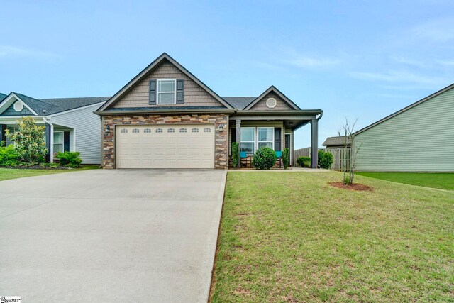 105 Devonfield Dr, Greer, SC 29651 - craftsman house with driveway, a front lawn, and stone siding
