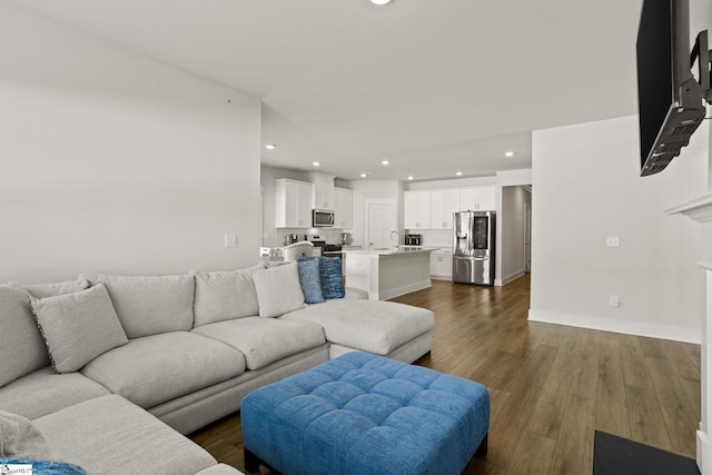 117 Hazelcroft Dr, Fountain Inn, SC 29644 - living room with recessed lighting, dark wood-style flooring, and baseboards