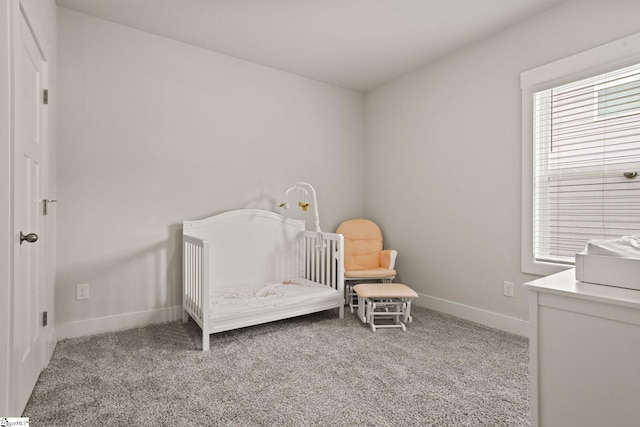 117 Hazelcroft Dr, Fountain Inn, SC 29644 - carpeted bedroom featuring a crib and baseboards