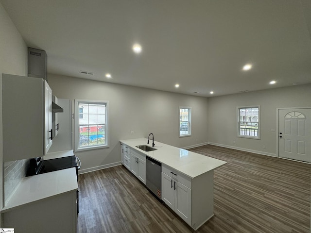 205 Magnolia St, Gaffney, SC 29340 - kitchen featuring stainless steel dishwasher, a peninsula, dark wood-type flooring, light countertops, and recessed lighting