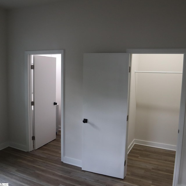 205 Magnolia St, Gaffney, SC 29340 - spare room featuring wood finished floors and baseboards