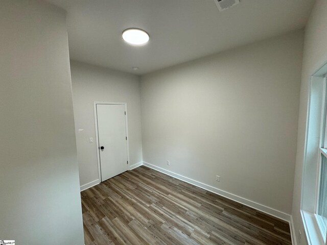 205 Magnolia St, Gaffney, SC 29340 - unfurnished room featuring dark wood finished floors and baseboards