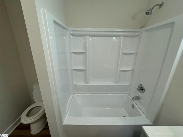 205 Magnolia St, Gaffney, SC 29340 - full bath featuring toilet, shower / tub combination, vanity, and wood finished floors