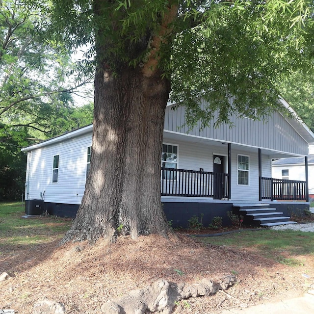 205 Magnolia St, Gaffney, SC 29340 - view of front of house featuring covered porch, central AC, and crawl space