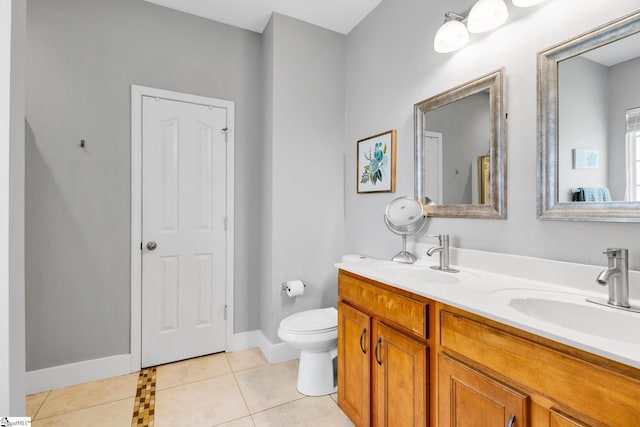103 Circle Grove Ct, Greer, SC 29650 - bathroom featuring double vanity, toilet, tile patterned floors, and baseboards