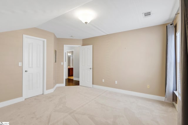 103 Circle Grove Ct, Greer, SC 29650 - unfurnished bedroom with light colored carpet, baseboards, and lofted ceiling