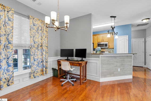103 Circle Grove Ct, Greer, SC 29650 - office area featuring wood finished floors, a chandelier, and wainscoting