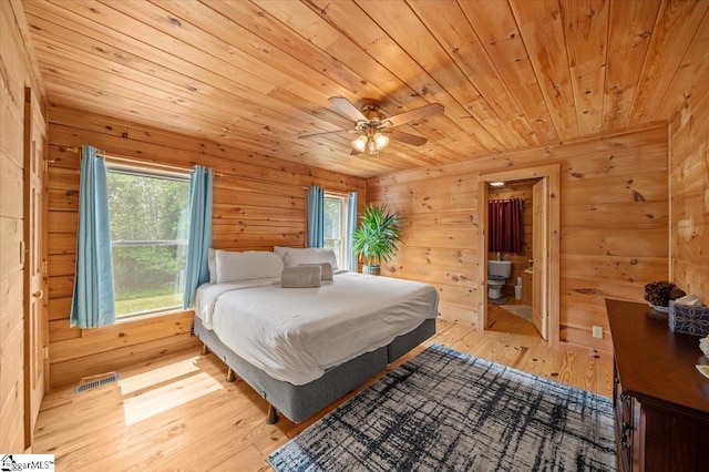 775 Buck Creek Rd, Chesnee, SC 29232 - bedroom featuring light wood finished floors, wood ceiling, multiple windows, wood walls, and a ceiling fan