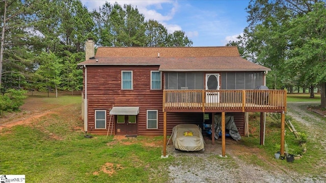 775 Buck Creek Rd, Chesnee, SC 29232 - rear view of property featuring a sunroom, dirt driveway, a chimney, a yard, and a shingled roof