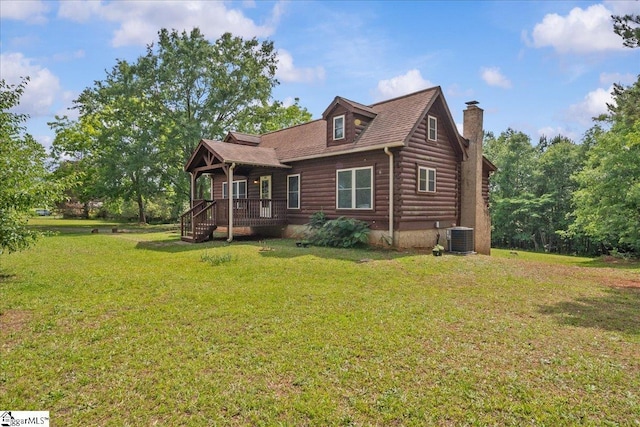 775 Buck Creek Rd, Chesnee, SC 29232 - log home featuring a chimney, cooling unit, a front yard, and log siding
