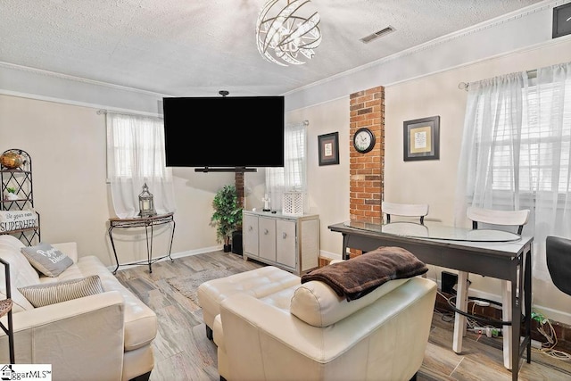 3 Creighton Ct, Taylors, SC 29687 - living area with crown molding, a textured ceiling, light wood-style flooring, and baseboards