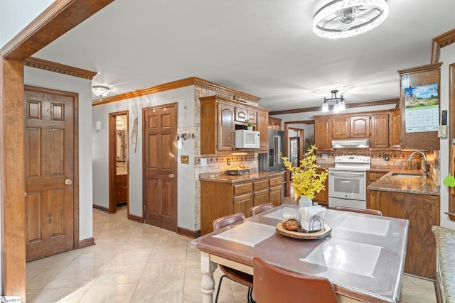 208 Forrester Creek Way, Greenville, SC 29607 - dining space with crown molding, baseboards, and ceiling fan