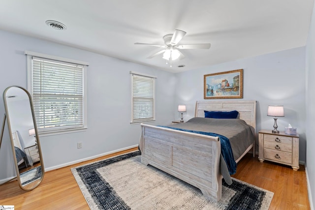 208 Forrester Creek Way, Greenville, SC 29607 - bedroom with wood finished floors, baseboards, and ceiling fan