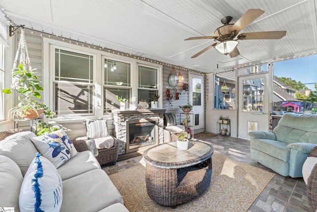 208 Forrester Creek Way, Greenville, SC 29607 - sunroom / solarium featuring an outdoor living space with a fireplace and ceiling fan