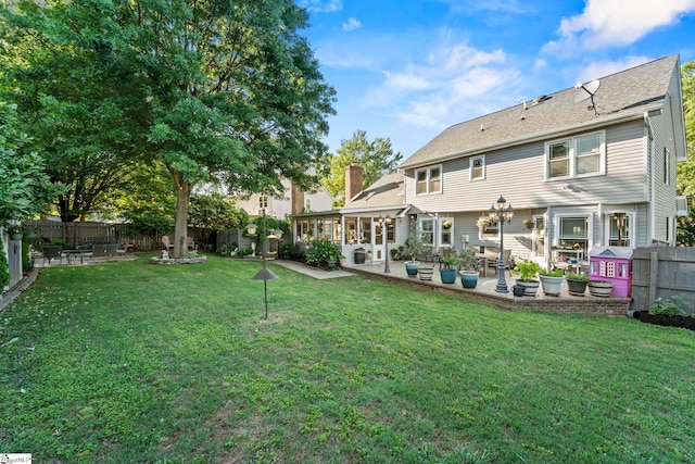 208 Forrester Creek Way, Greenville, SC 29607 - back of house featuring a patio, a sunroom, and a shingled roof