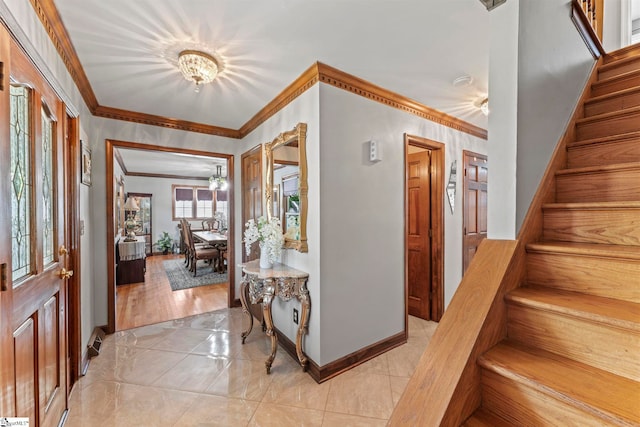 208 Forrester Creek Way, Greenville, SC 29607 - entrance foyer featuring a chandelier, stairway, baseboards, and ornamental molding