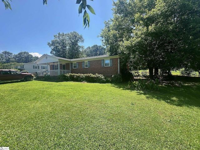 148 Southland Ave, Boiling Springs, SC 29316 - view of front of home featuring a front lawn and brick siding