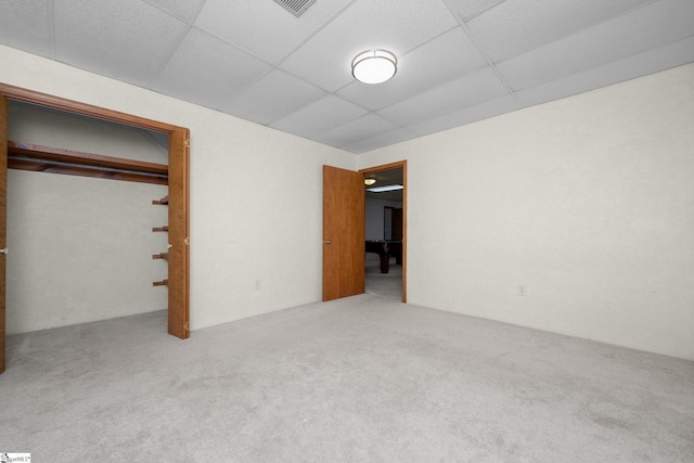 223 Covington Rd, Greenville, SC 29617 - unfurnished bedroom with carpet, a paneled ceiling, and a closet