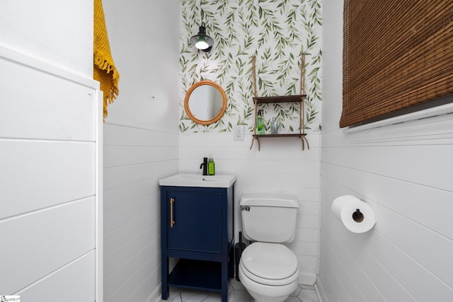 110 Sycamore Dr, Mauldin, SC 29662 - bathroom featuring vanity, wainscoting, toilet, and tile patterned floors