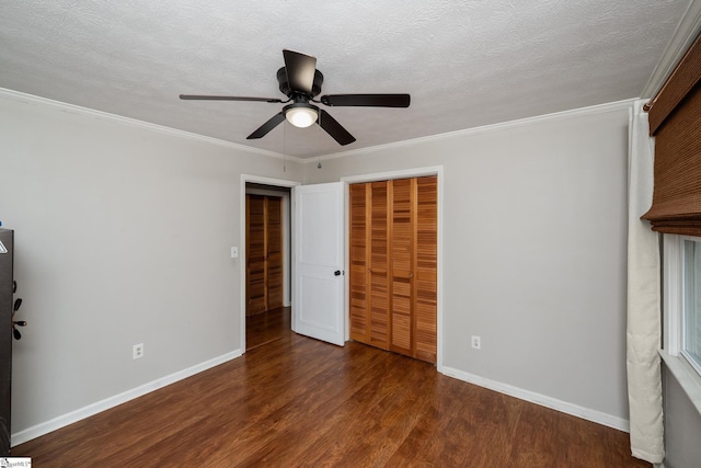 110 Sycamore Dr, Mauldin, SC 29662 - unfurnished bedroom with wood finished floors, crown molding, baseboards, a closet, and ceiling fan