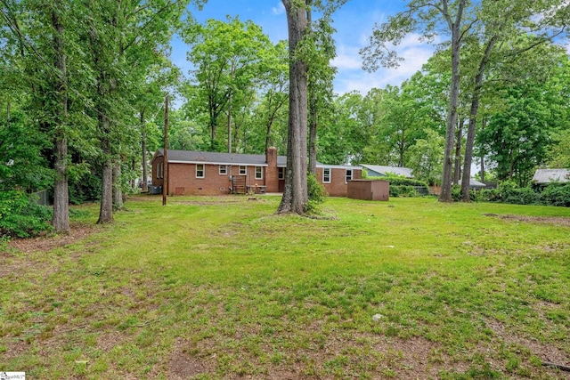 110 Sycamore Dr, Mauldin, SC 29662 - view of green lawn with an outdoor structure