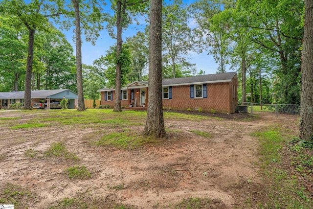 110 Sycamore Dr, Mauldin, SC 29662 - ranch-style home featuring brick siding, a detached carport, and cooling unit