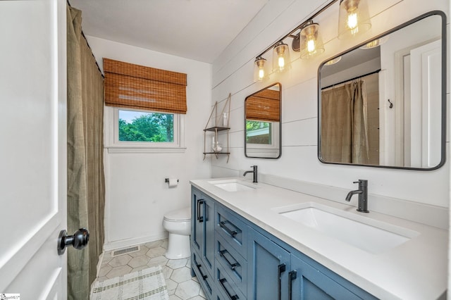 110 Sycamore Dr, Mauldin, SC 29662 - bathroom featuring double vanity, tile patterned floors, and toilet
