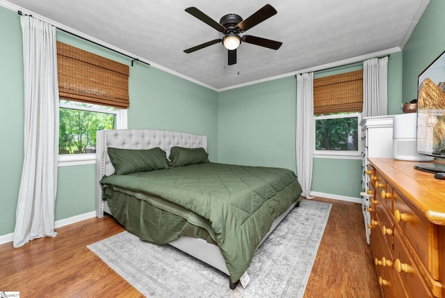 110 Sycamore Dr, Mauldin, SC 29662 - bedroom featuring baseboards, wood finished floors, ornamental molding, and ceiling fan