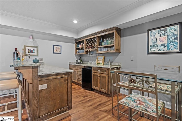 135 Neal Pointe Dr, Chesnee, SC 29323 - indoor wet bar with wood finished floors, ornamental molding, and recessed lighting